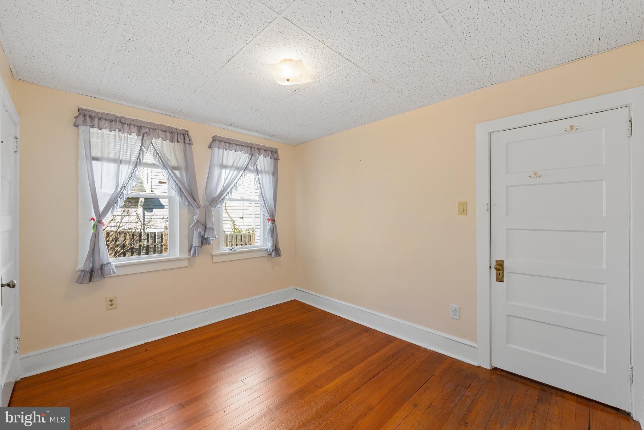 226 South Pine Avenue Maple Shade, NJ 08052 - Photo 22 of 39 an empty room with wooden floor and windows