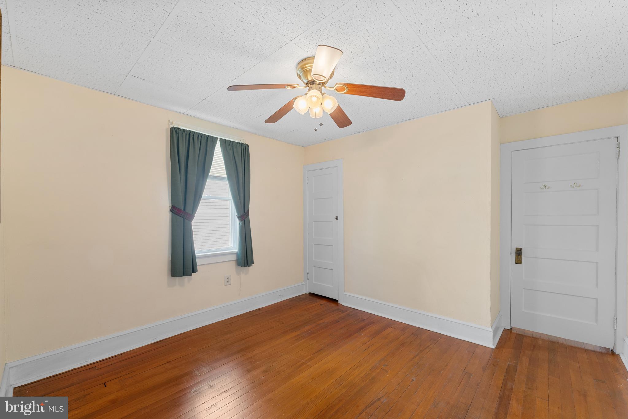 226 South Pine Avenue Maple Shade, NJ 08052 - Photo 26 of 39 wooden floor in an empty room with a window