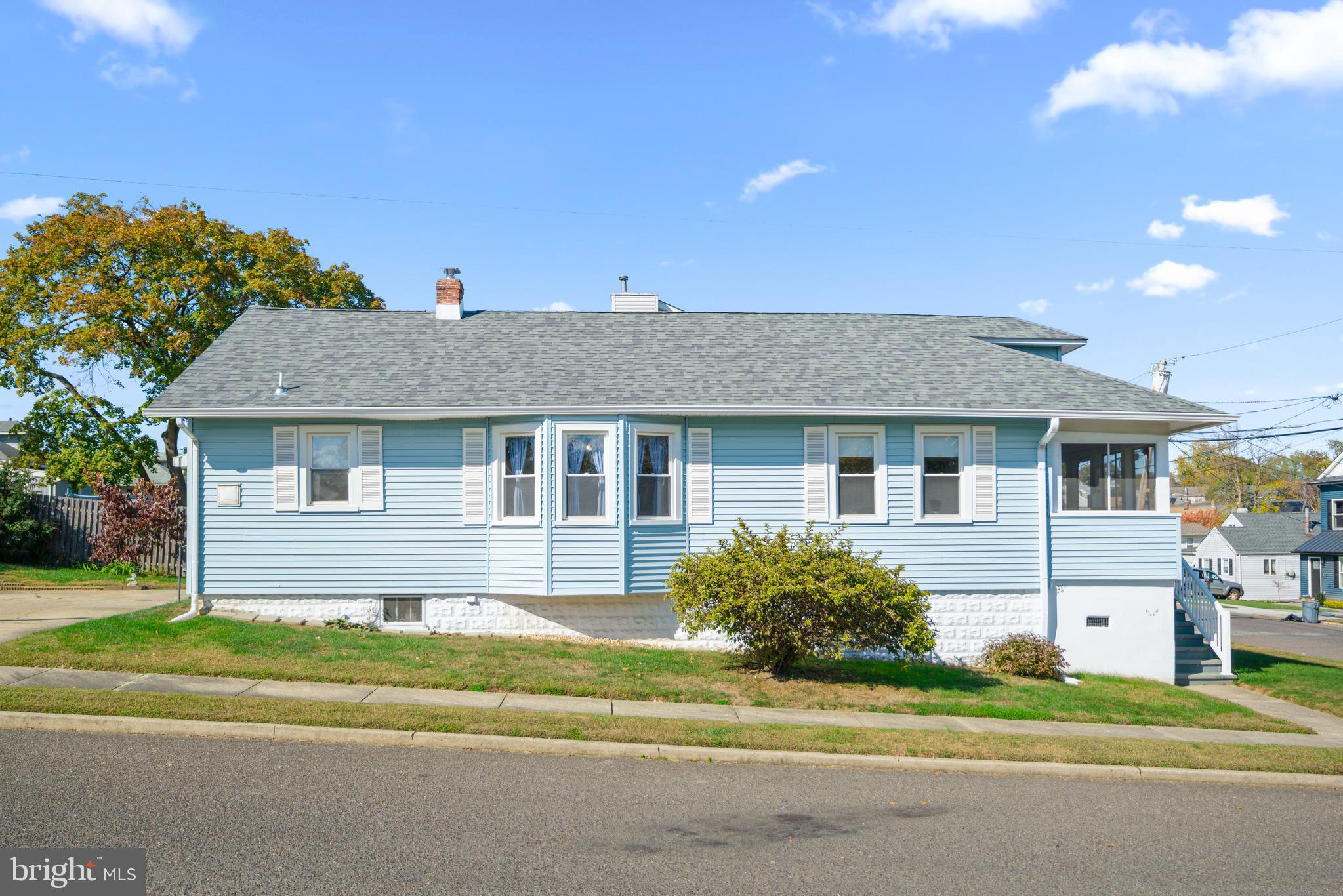 226 South Pine Avenue Maple Shade, NJ 08052 - Photo 37 of 39 a front view of a house with a garden and yard