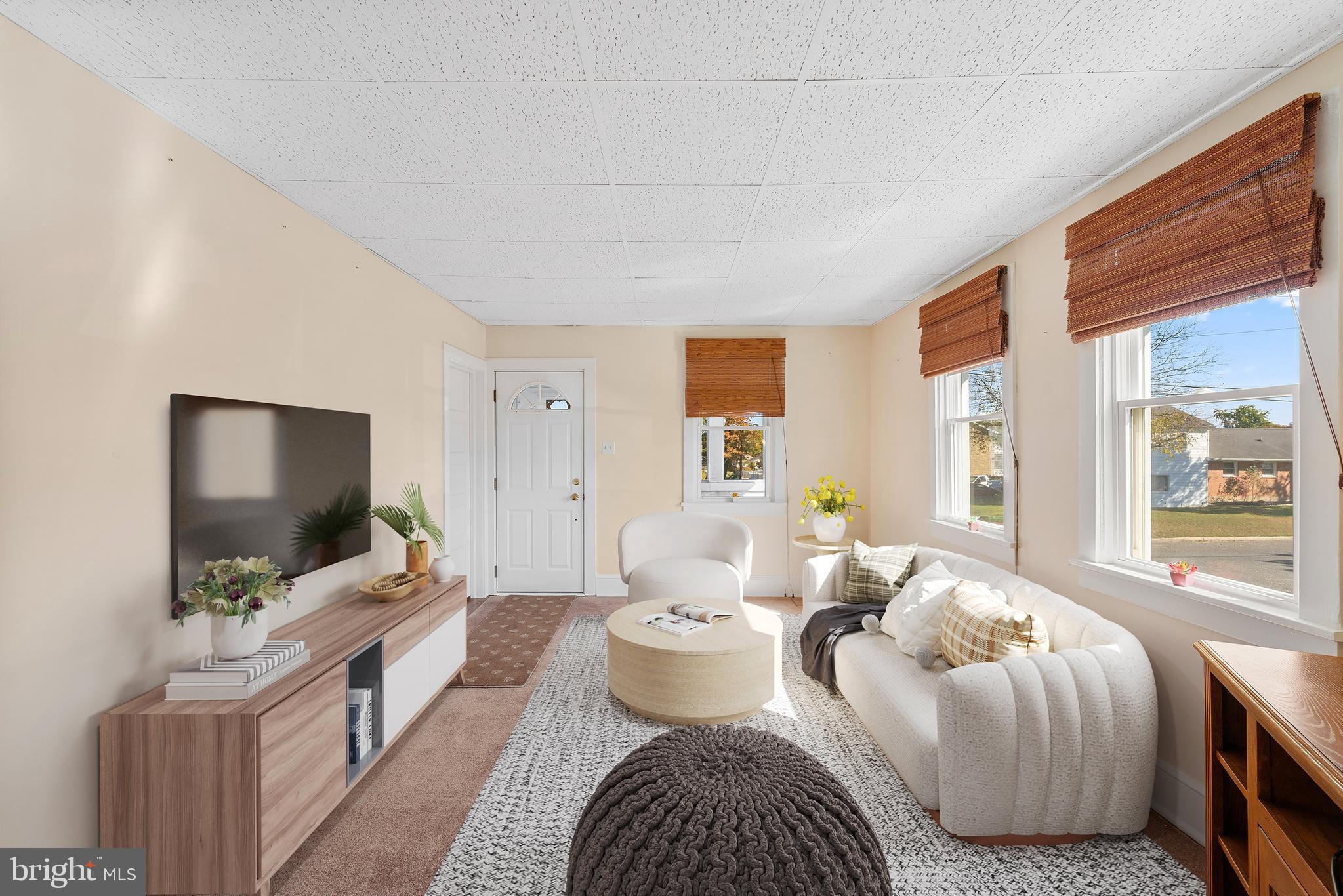 226 South Pine Avenue Maple Shade, NJ 08052 - Photo 5 of 39 a living room with furniture and a flat screen tv