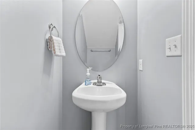 a sink with a mirror