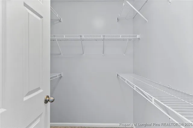 a view of small space with racks on the wall