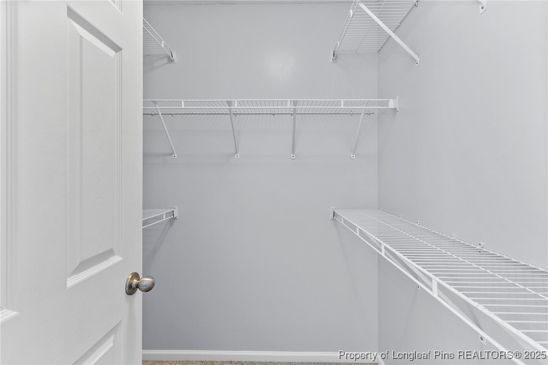 198 Cape Fear Road Raeford, NC 28376 - Photo 17 of 32 a view of small space with racks on the wall