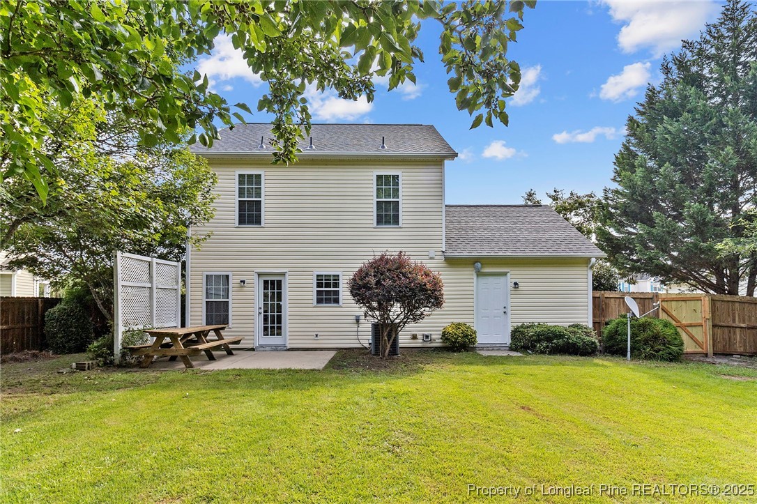 198 Cape Fear Road Raeford, NC 28376 - Photo 29 of 32 a front view of house with yard and trees