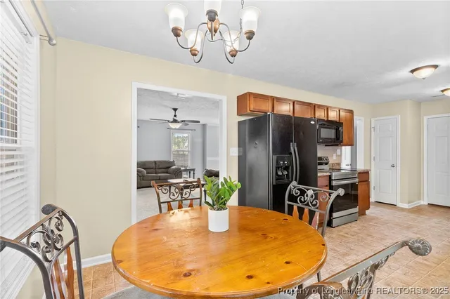 a dining room with wooden floor