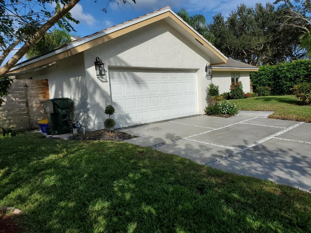 2403 Northwest 30th Road Boca Raton, FL 33431 - Photo 4 of 18 TIMBERCREEK NEW DRIVEWAY AND GARAGE DOOR