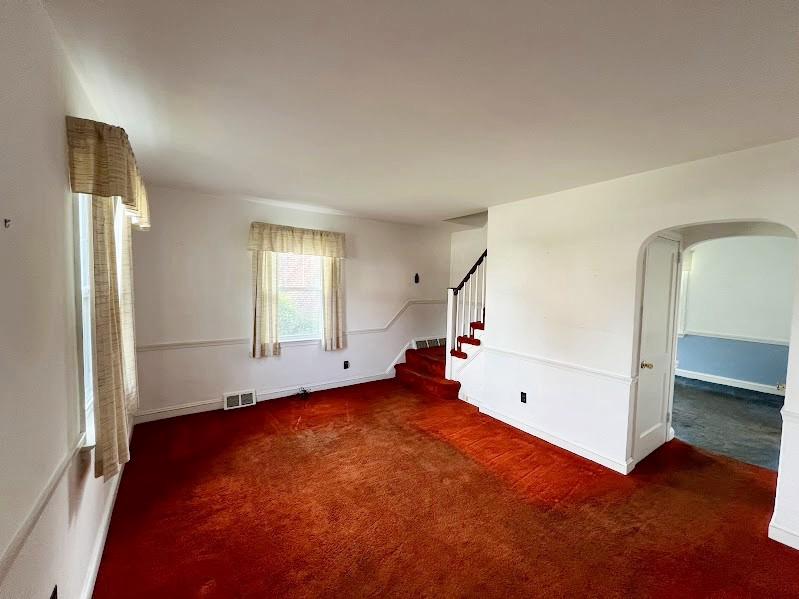 310 Edgemore Road Secane, PA 19018 - Photo 6 of 19 an empty room with windows and entrance