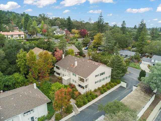 an aerial view of a house with a garden