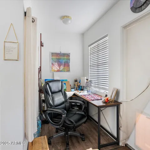 a white toilet sitting next to a bathroom sink