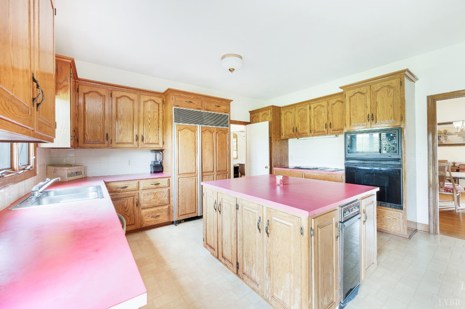 837 Gidsville Road Amherst, VA 24521 - Photo 30 of 82 a kitchen with stainless steel appliances kitchen island granite countertop a sink and cabinets