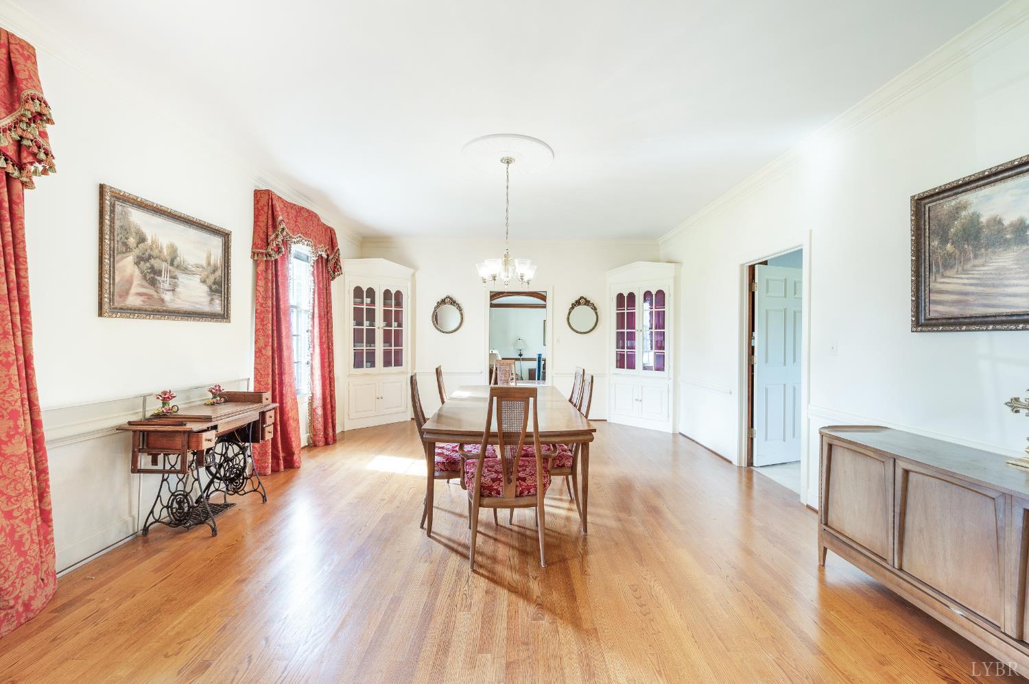 837 Gidsville Road Amherst, VA 24521 - Photo 31 of 82 a view of a dining room with furniture window and wooden floor