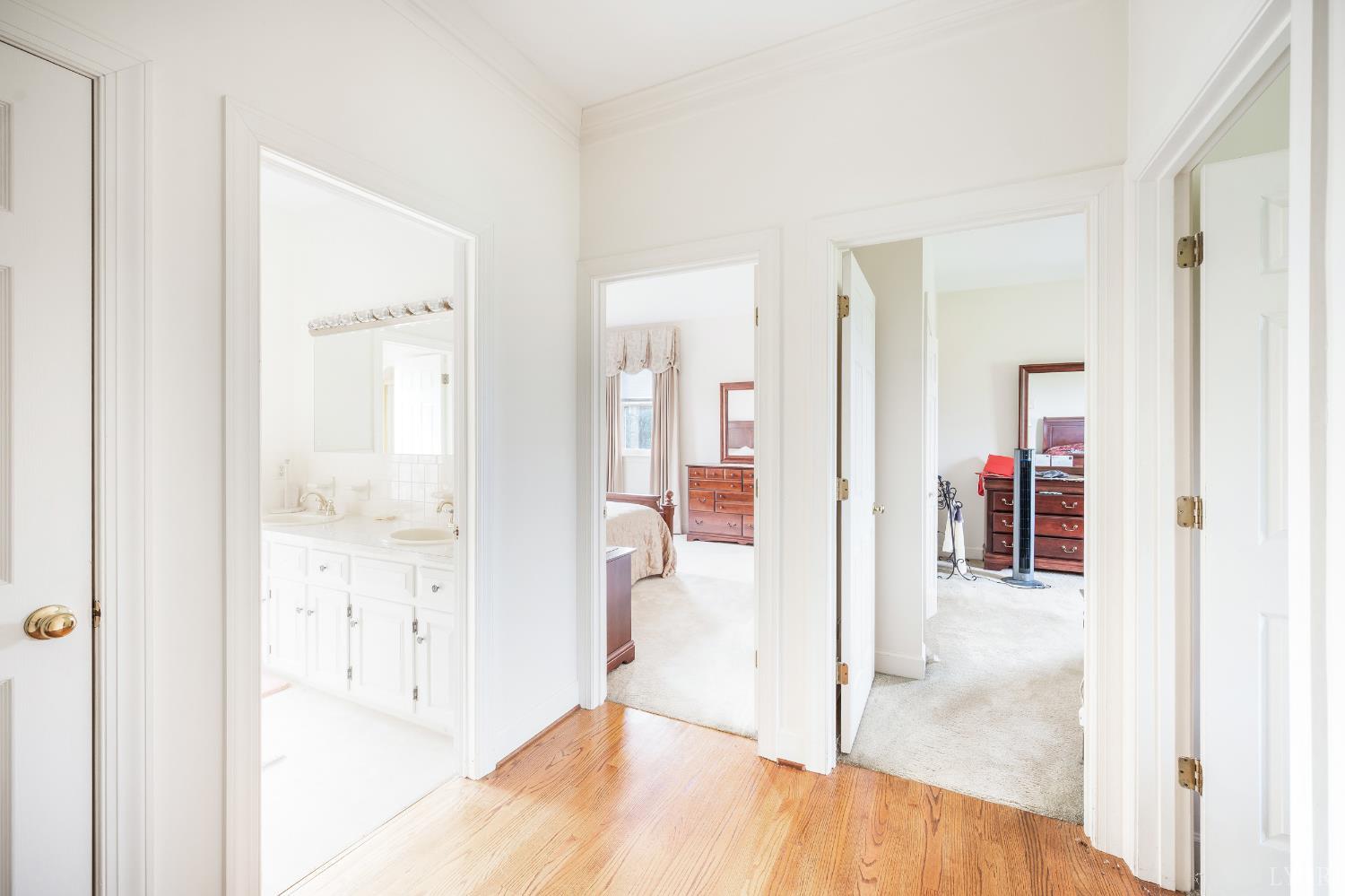 837 Gidsville Road Amherst, VA 24521 - Photo 45 of 82 a view of a hallway with wooden floor and a living room