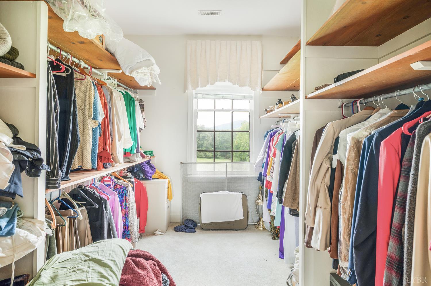 837 Gidsville Road Amherst, VA 24521 - Photo 49 of 82 a view of walk in closet with clothes and shoes