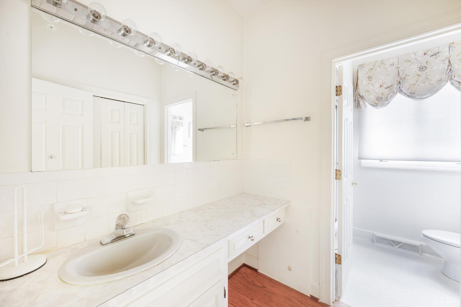 837 Gidsville Road Amherst, VA 24521 - Photo 53 of 82 a bathroom with a sink and a mirror