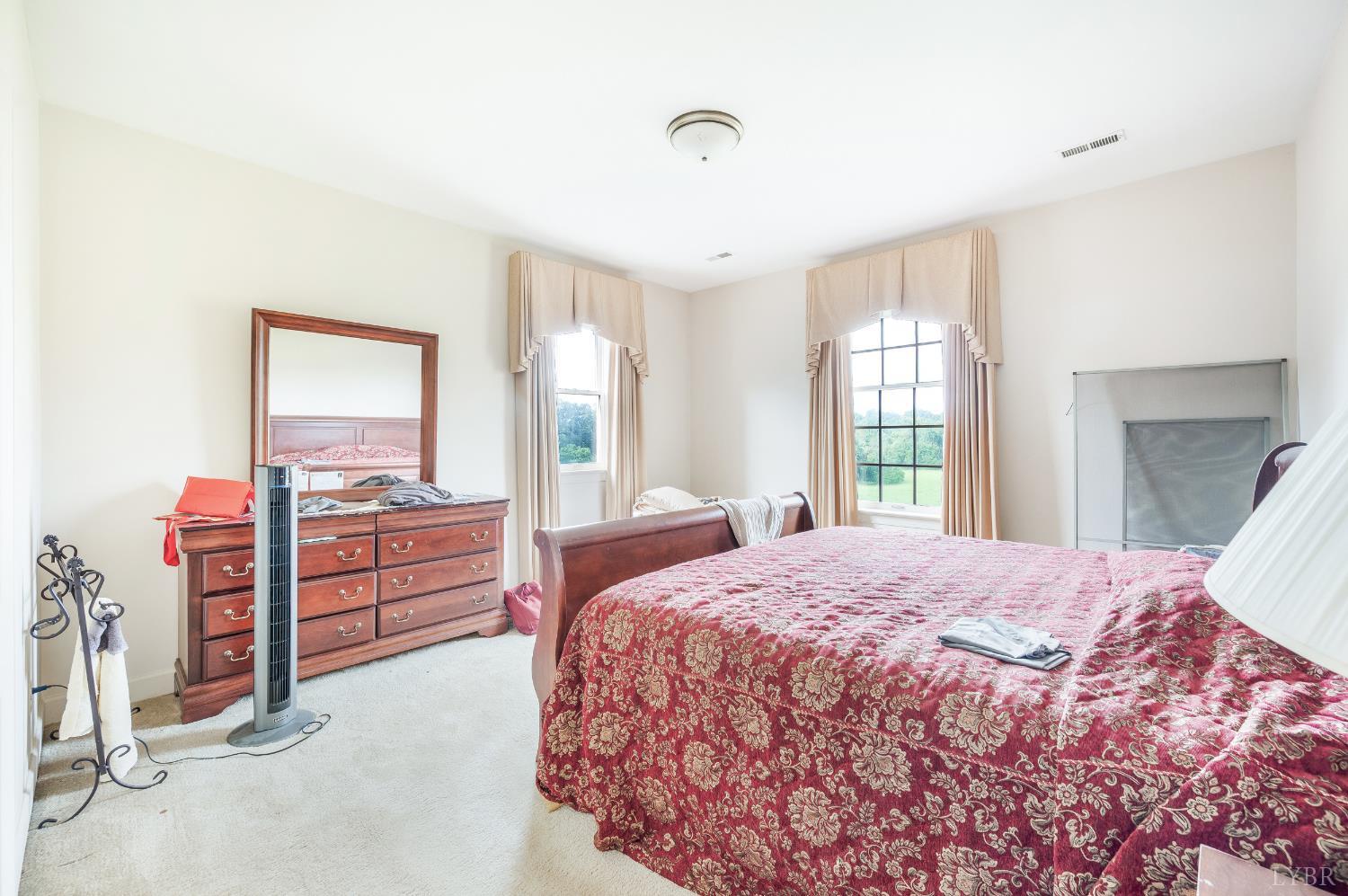 837 Gidsville Road Amherst, VA 24521 - Photo 56 of 82 a bedroom with a bed and a window