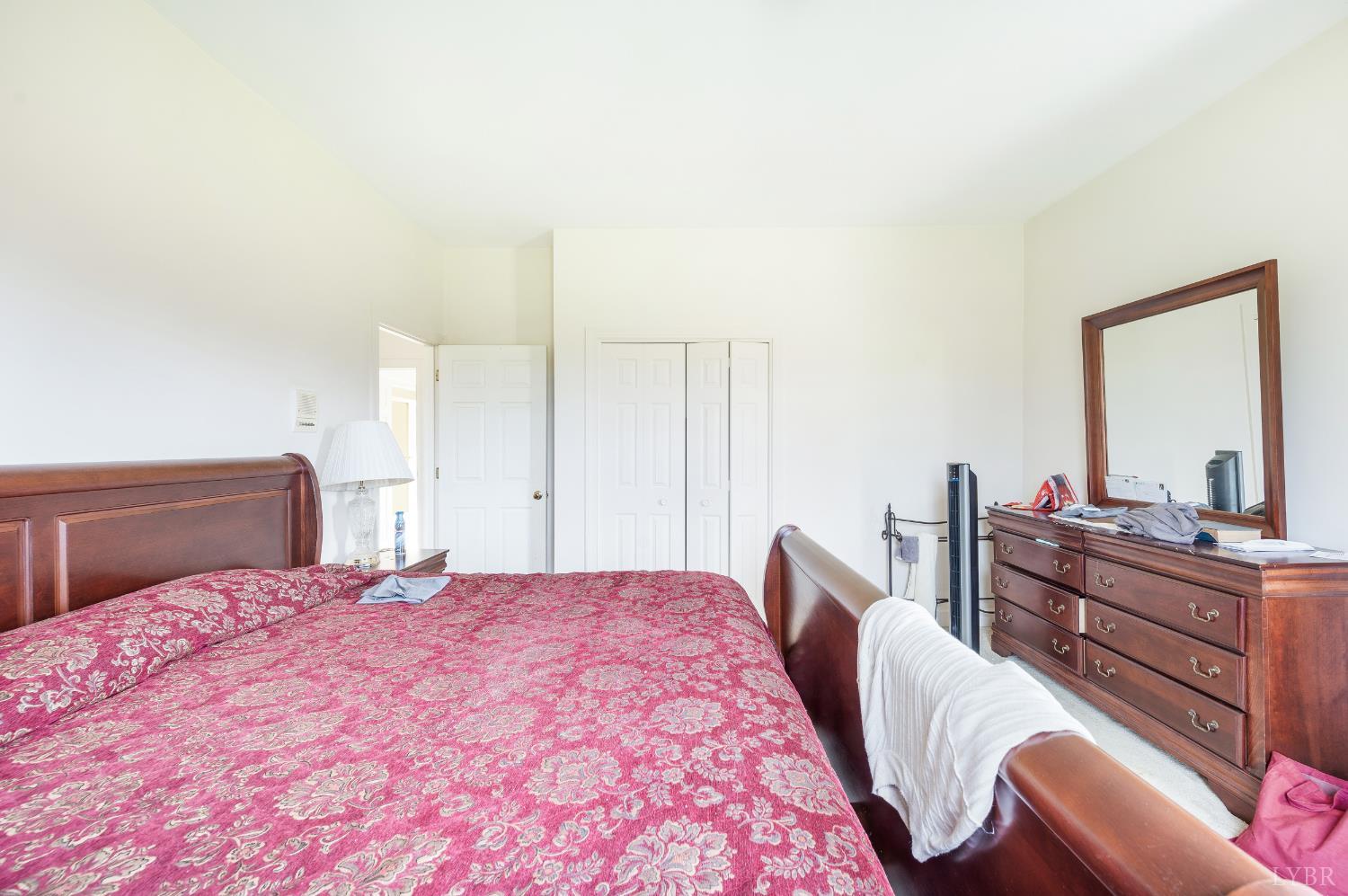 837 Gidsville Road Amherst, VA 24521 - Photo 57 of 82 a bedroom with a bed and a dresser
