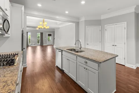a kitchen with a sink and cabinets