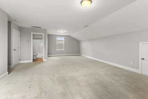 an empty room with a natural light