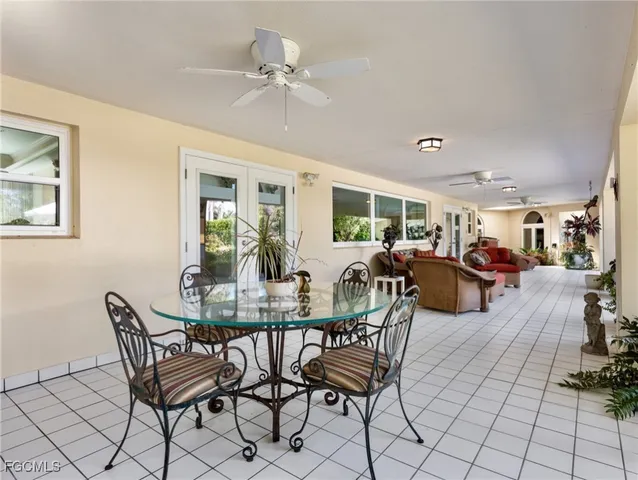 a front view of a house with fountain bath tub and couches