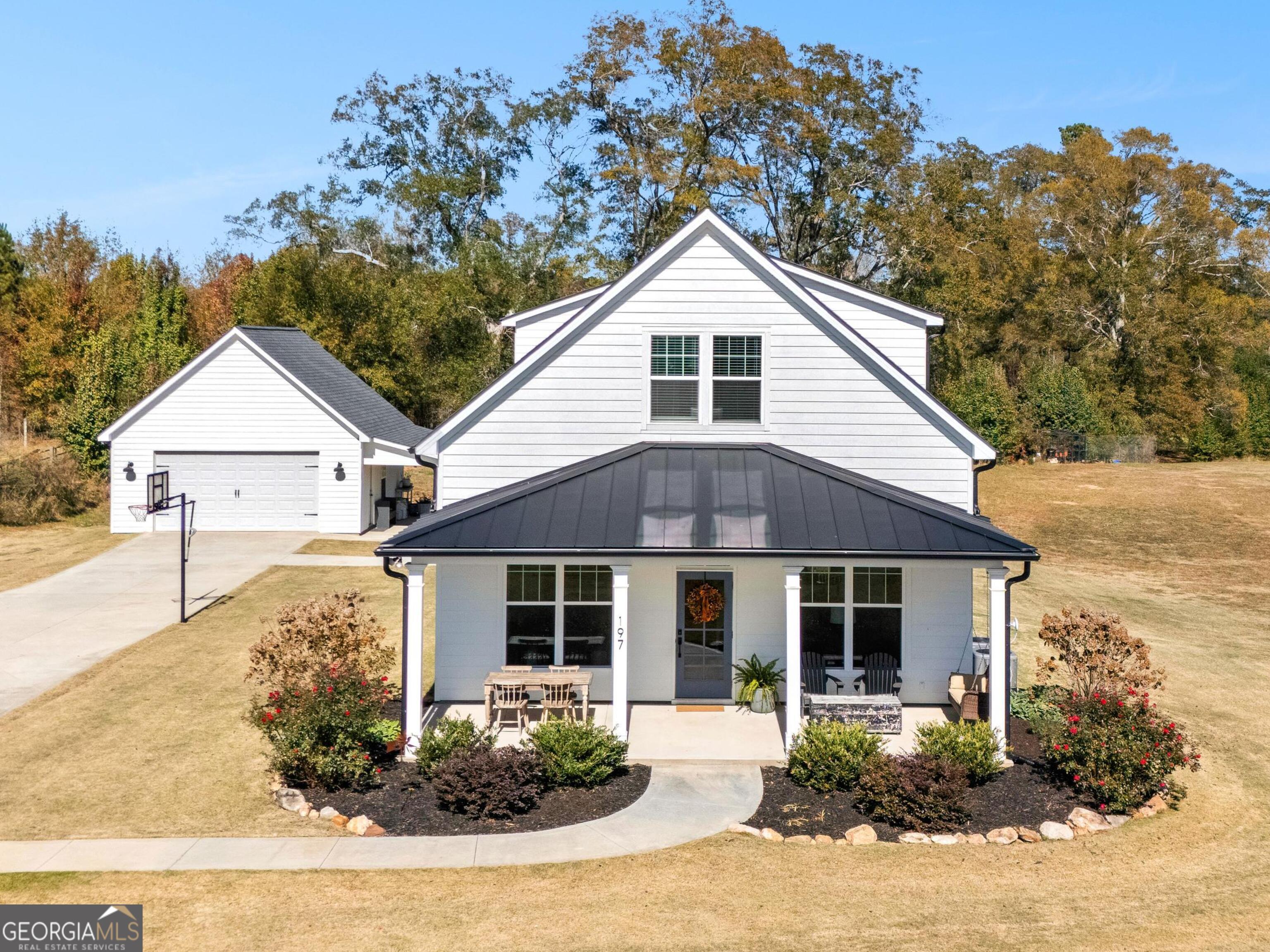 197 Dunn Road Molena, GA 30258 - Photo 1 of 76 a view of a house with a yard