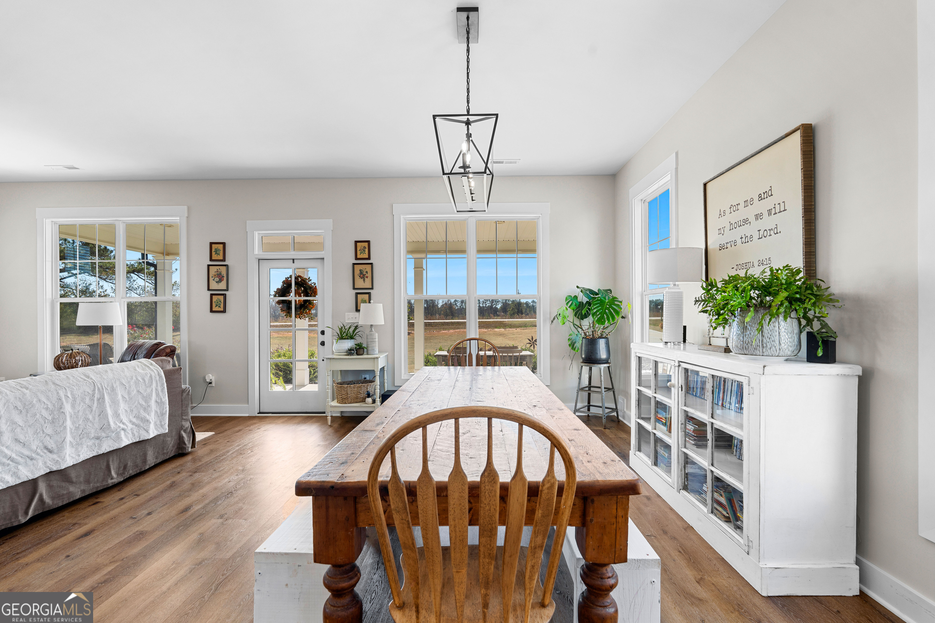 197 Dunn Road Molena, GA 30258 - Photo 18 of 76 a view of a living room and a window with furniture