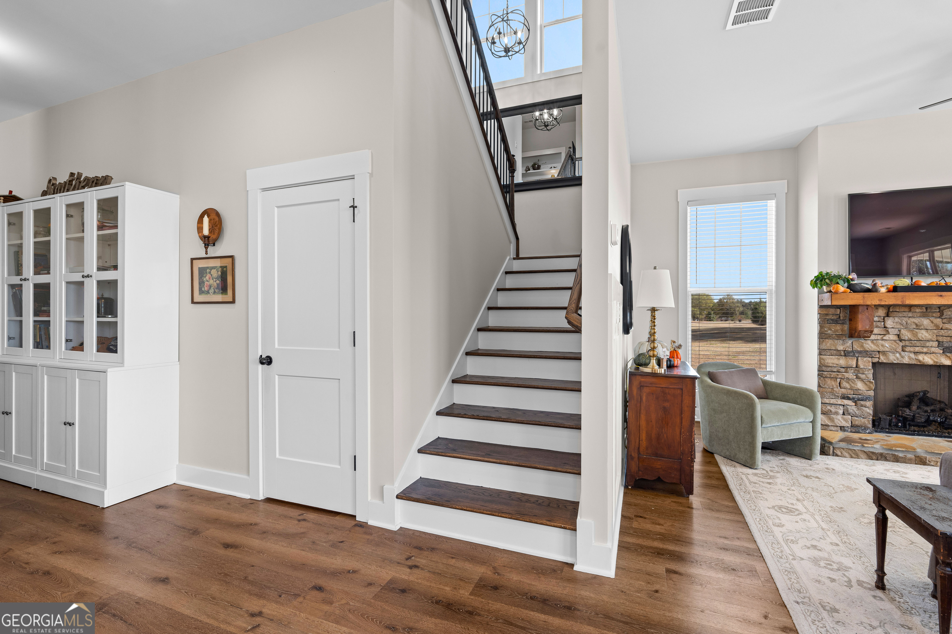 197 Dunn Road Molena, GA 30258 - Photo 24 of 76 a view of a livingroom with wooden floor and furniture