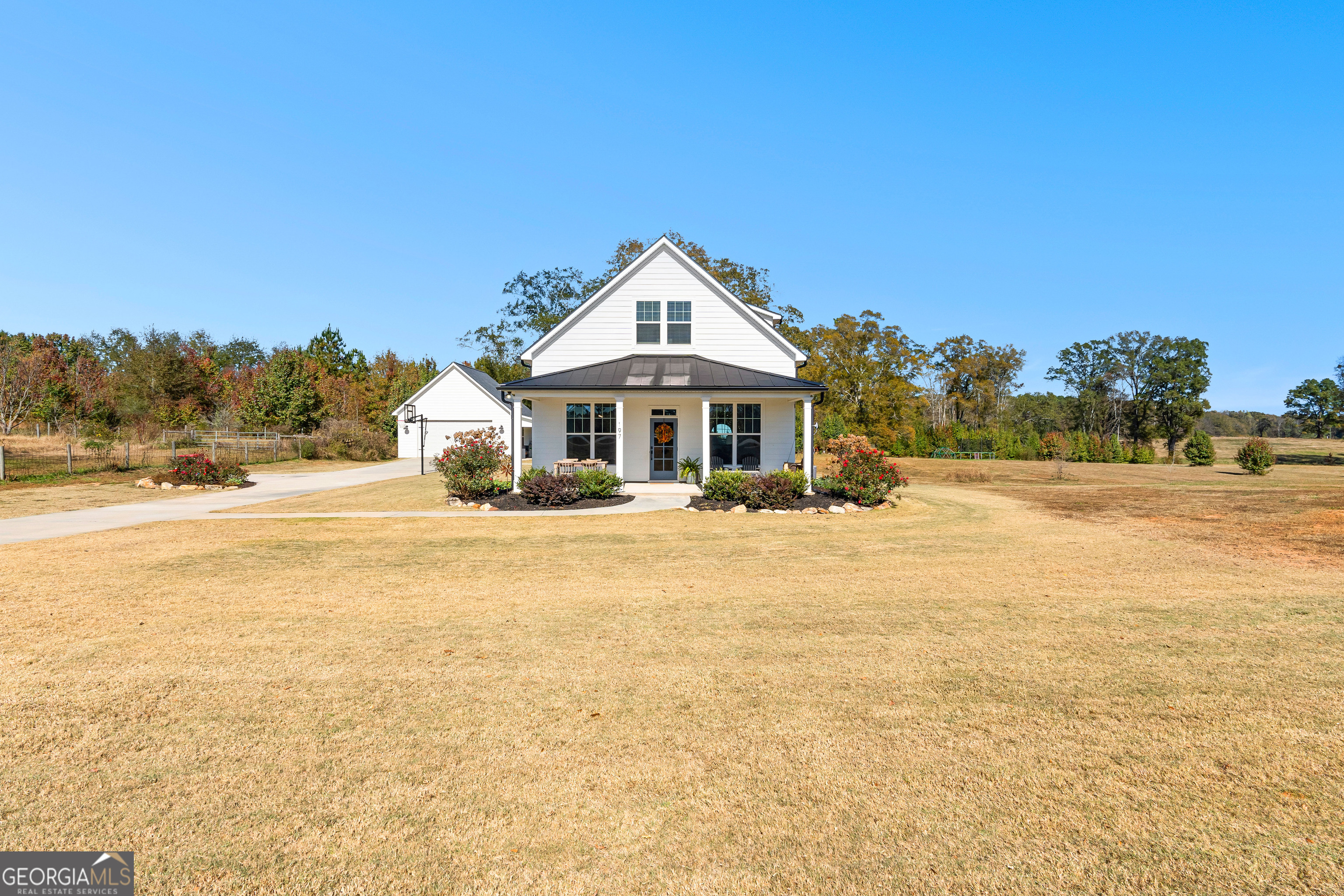 197 Dunn Road Molena, GA 30258 - Photo 4 of 76 a front view of a house with a yard