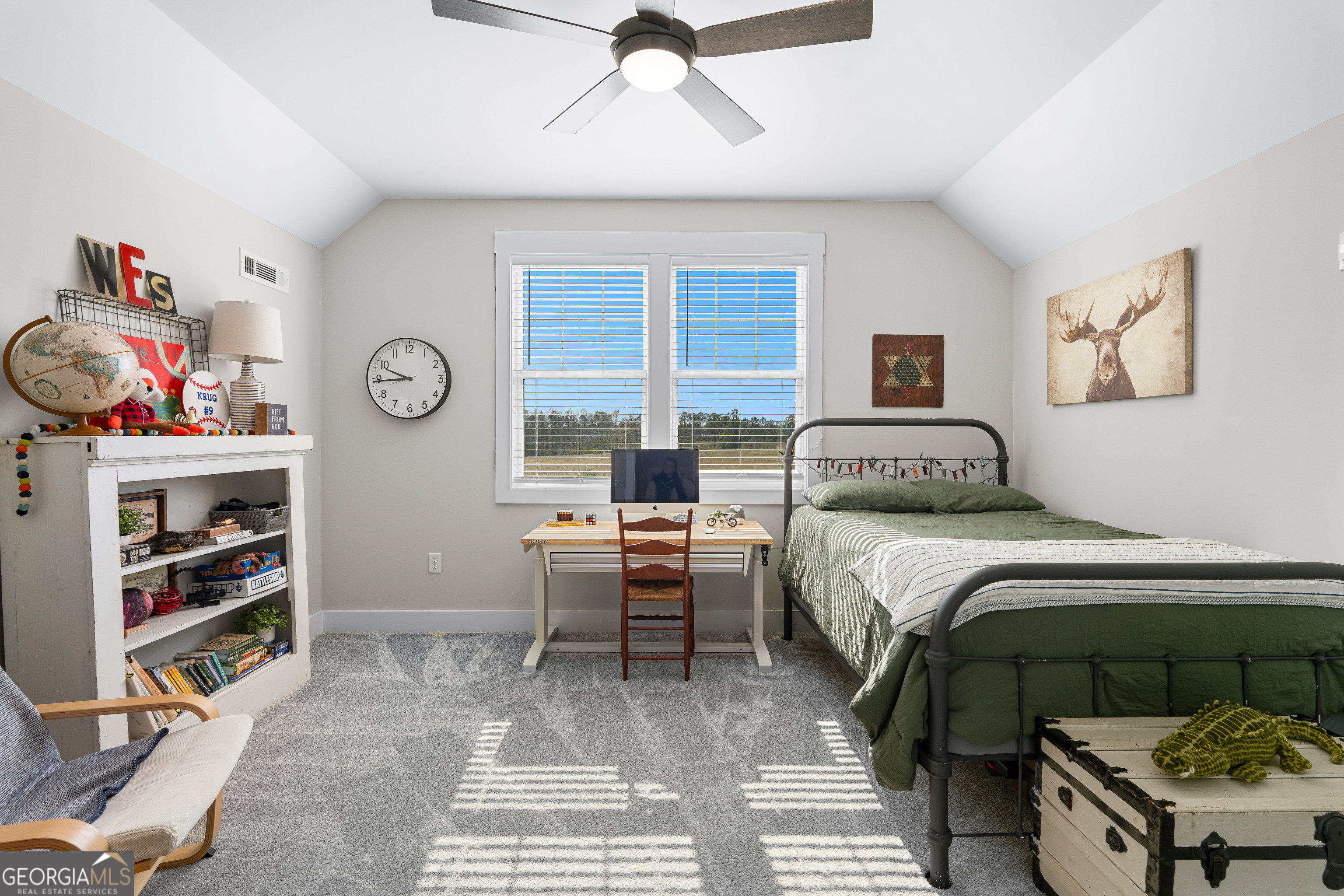 197 Dunn Road Molena, GA 30258 - Photo 41 of 76 a bedroom with a bed and a window