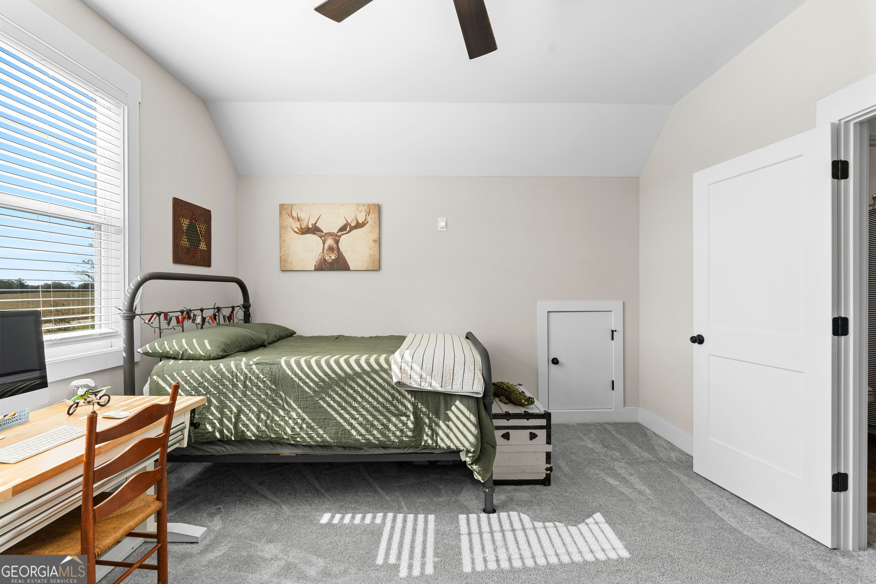 197 Dunn Road Molena, GA 30258 - Photo 42 of 76 a bedroom with a bed and a couch