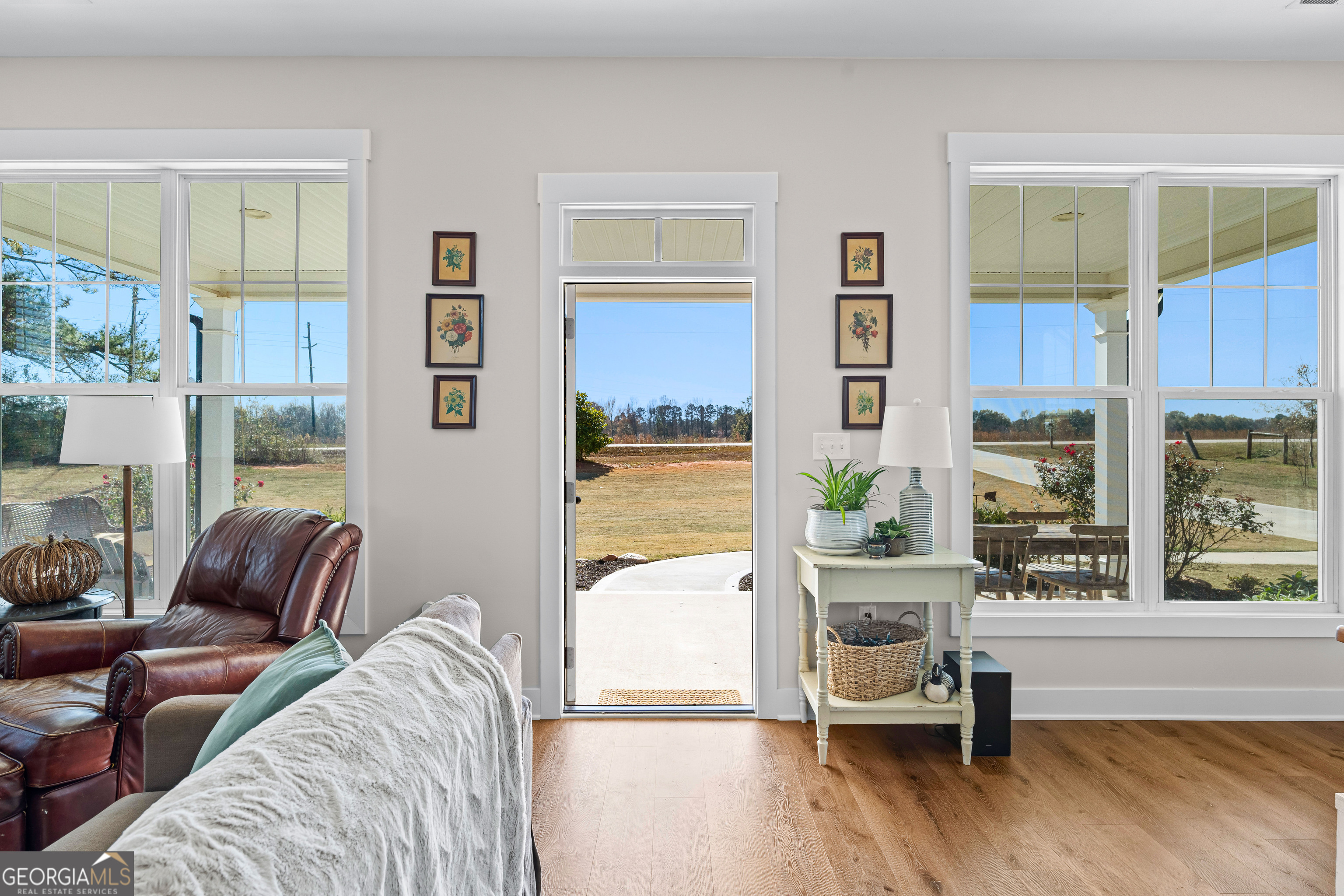 197 Dunn Road Molena, GA 30258 - Photo 10 of 76 a living room with furniture and a large window