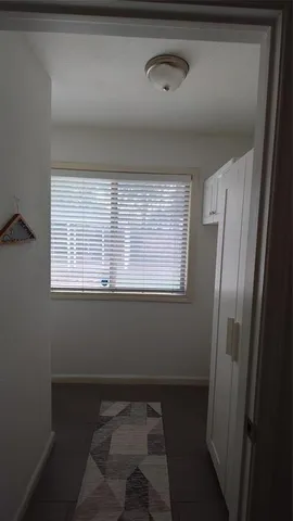 a view of a closet in a room