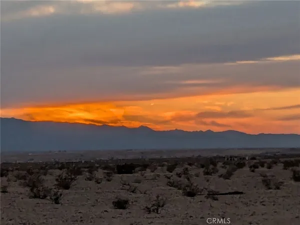a view of an outdoor space and mountain view