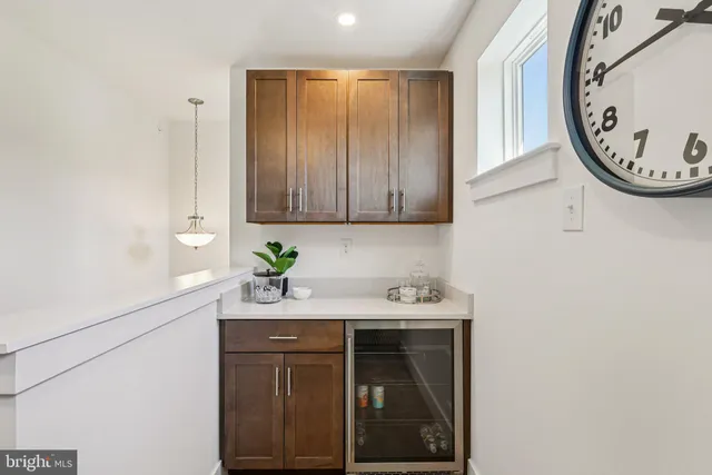 a view of a two chairs in the patio