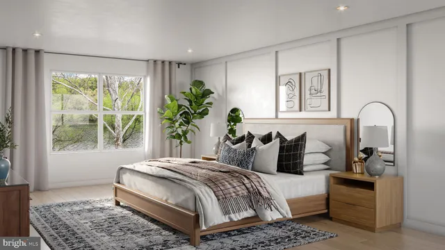 a view of a balcony with chairs and wooden floor