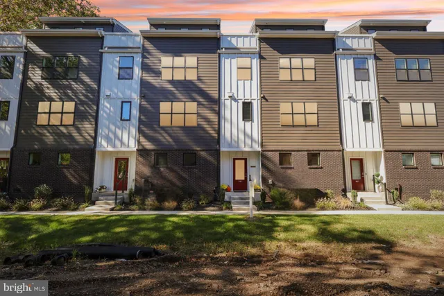 an aerial view of a city with lots of residential buildings