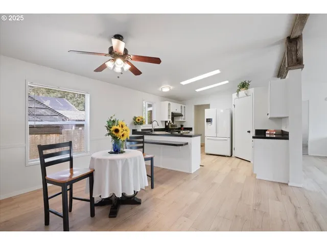 a view of kitchen with breakfast area
