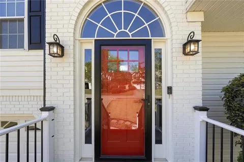 a front view of a house with a door