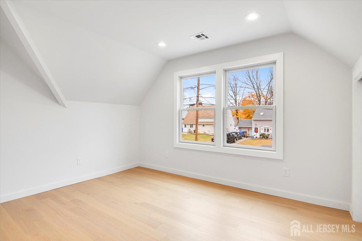 130 Ridge Road Colonia, NJ 07067 - Photo 21 of 28 an empty room with windows