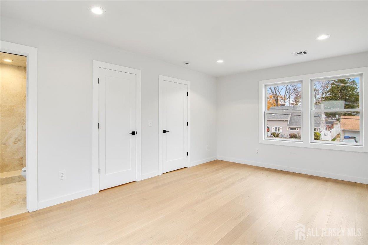 130 Ridge Road Colonia, NJ 07067 - Photo 24 of 28 a view of an empty room with a window