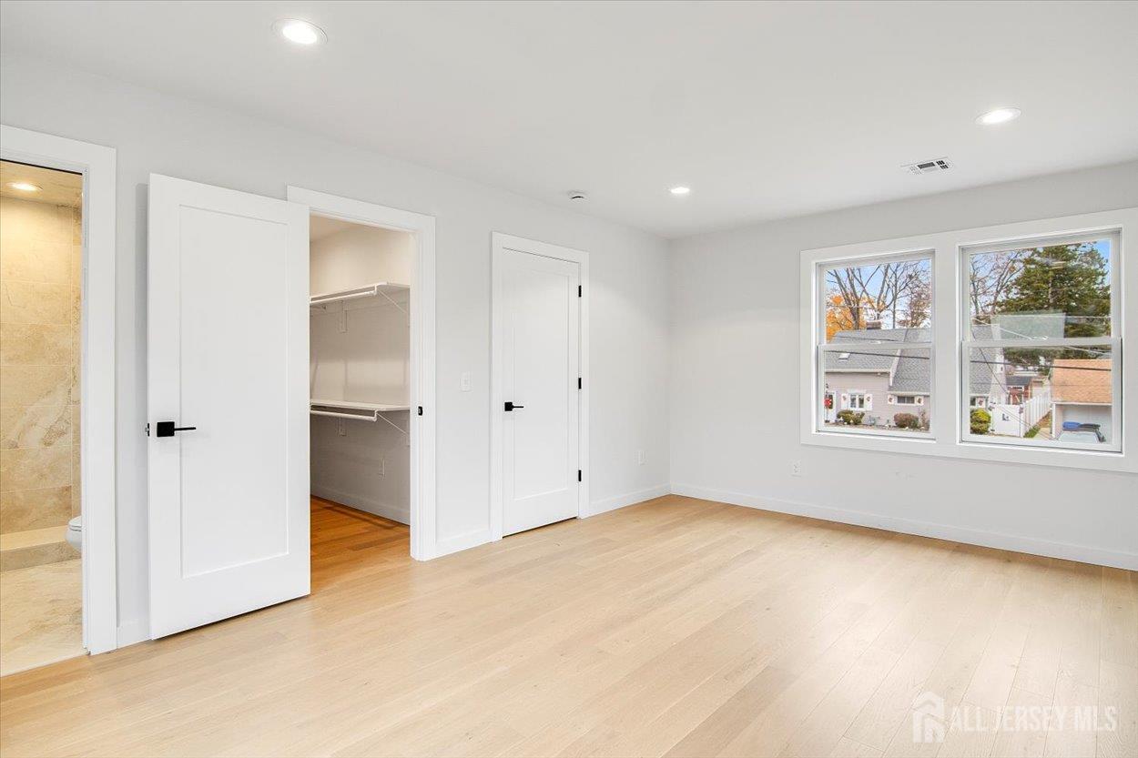 130 Ridge Road Colonia, NJ 07067 - Photo 25 of 28 a view of an empty room with a window