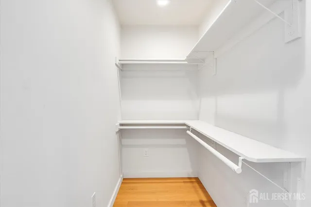a view of an empty walk in closet