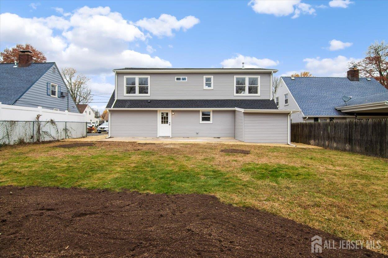 130 Ridge Road Colonia, NJ 07067 - Photo 28 of 28 a front view of a house with a yard