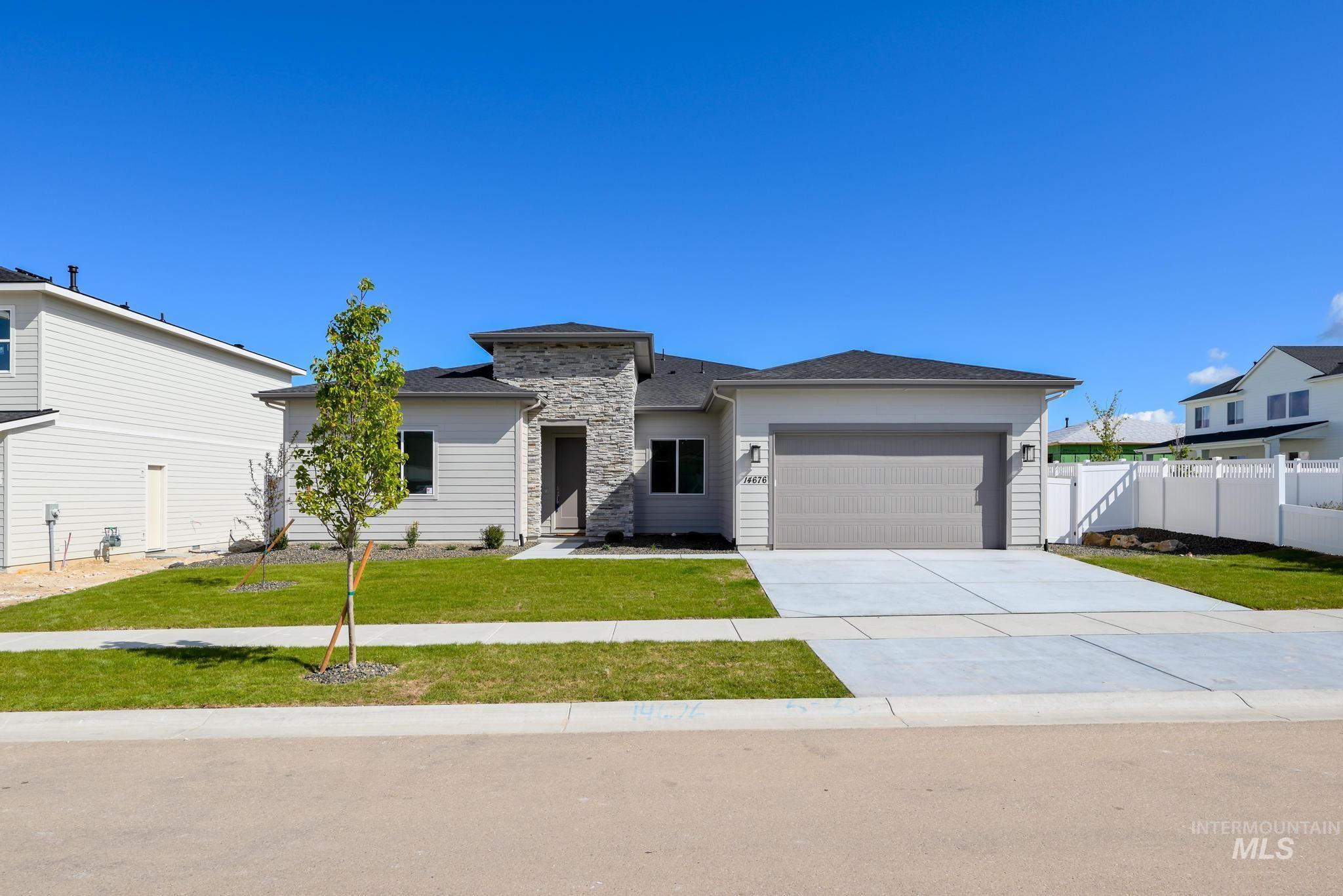 14676 Serenity Pt Street Caldwell, ID 83607 - Photo 1 of 41 Single-story residence featuring light-colored siding and a stone facade accent