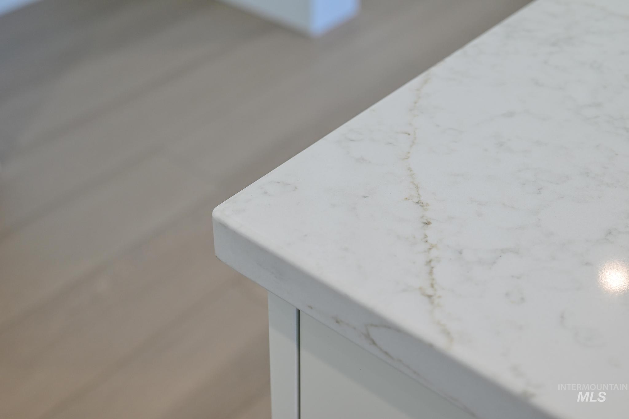 14676 Serenity Pt Street Caldwell, ID 83607 - Photo 15 of 41 White countertop with subtle veining and a rounded edge profile