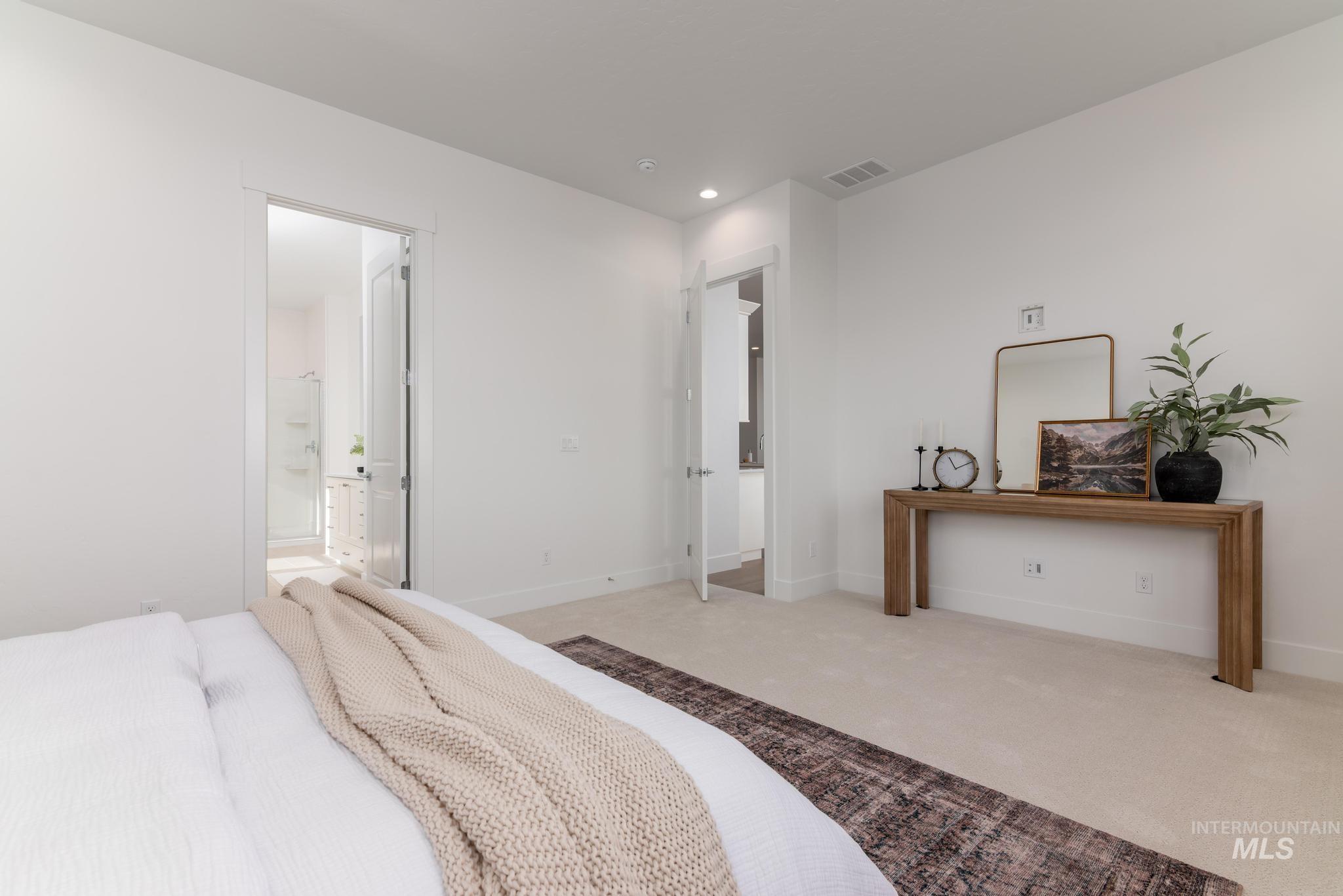 14676 Serenity Pt Street Caldwell, ID 83607 - Photo 20 of 41 Bright interior space featuring light-toned carpeting and white walls