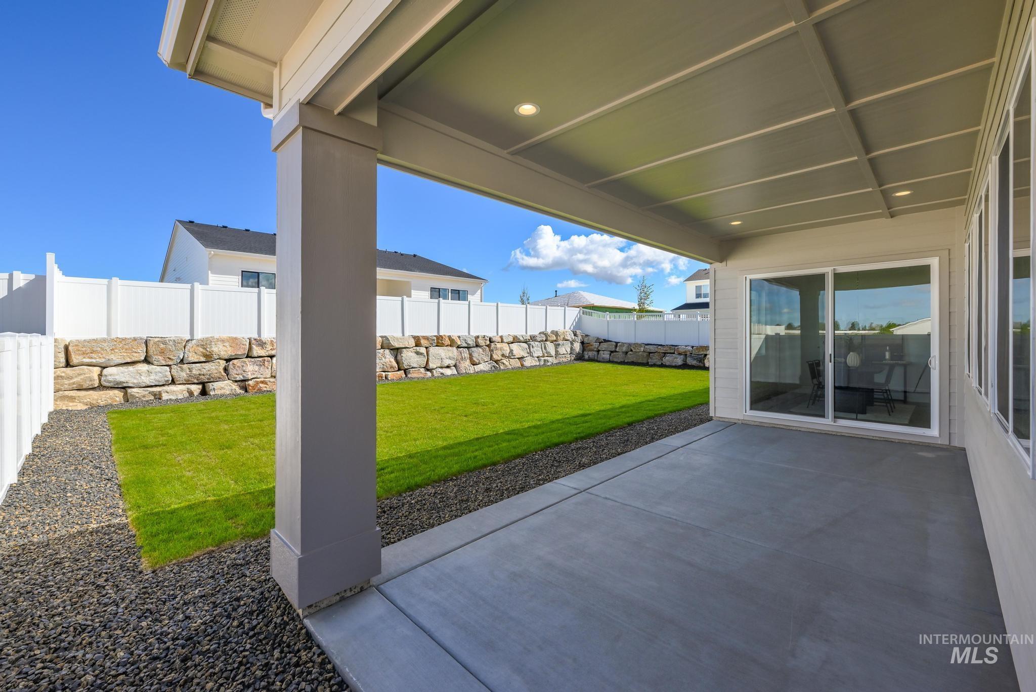 14676 Serenity Pt Street Caldwell, ID 83607 - Photo 29 of 41 Covered concrete patio with recessed lighting, offering access to the interior via sliding glass doors