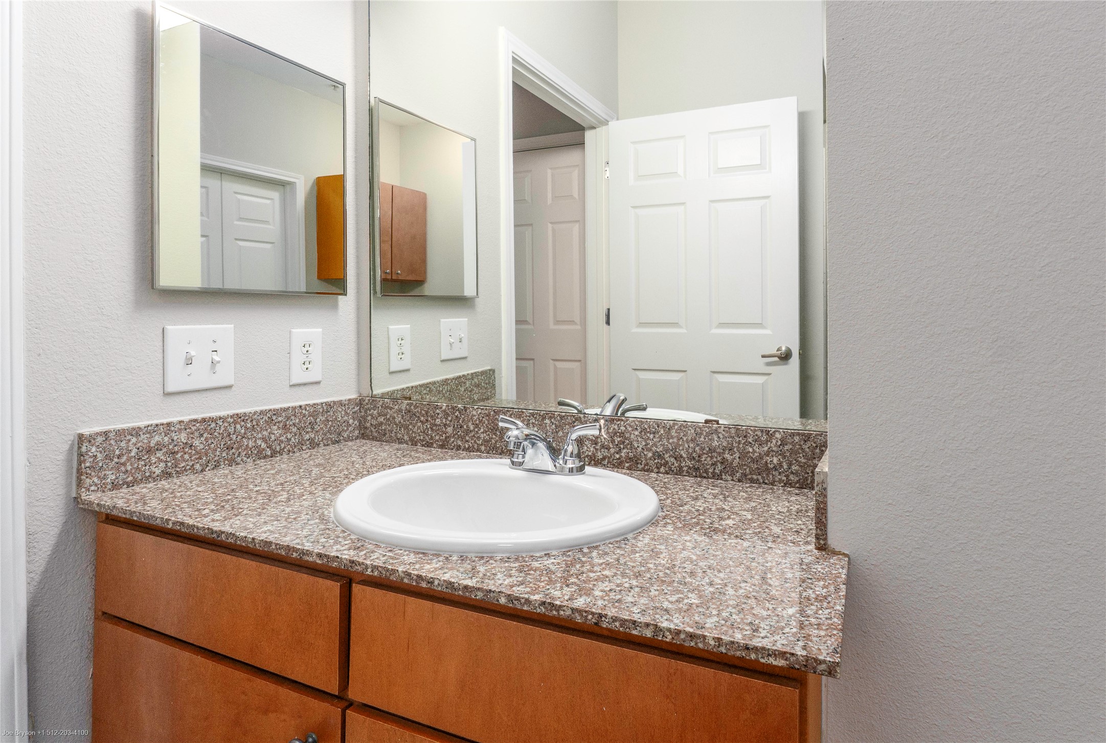 2502 Leon Street, Unit 305 Austin, TX 78705 - Photo 19 of 26 Bath vanity 2nd bedroom