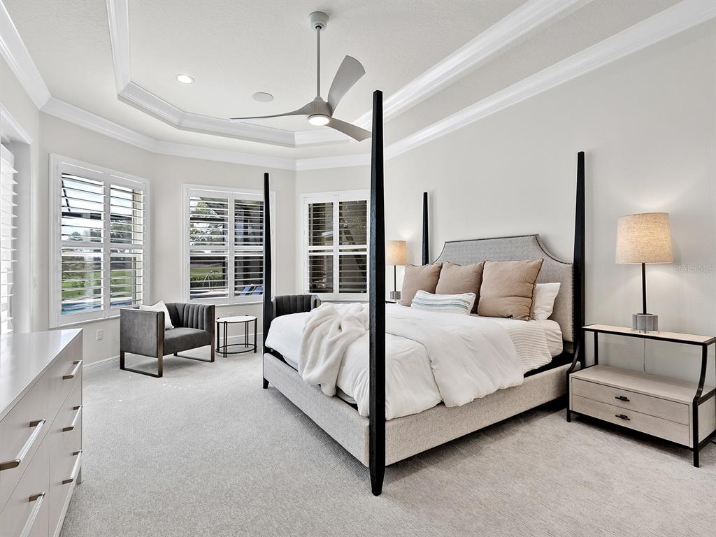 7431 Greystone Street Lakewood Ranch, FL 34202 - Photo 35 of 85 a bed room with a bed and a couch