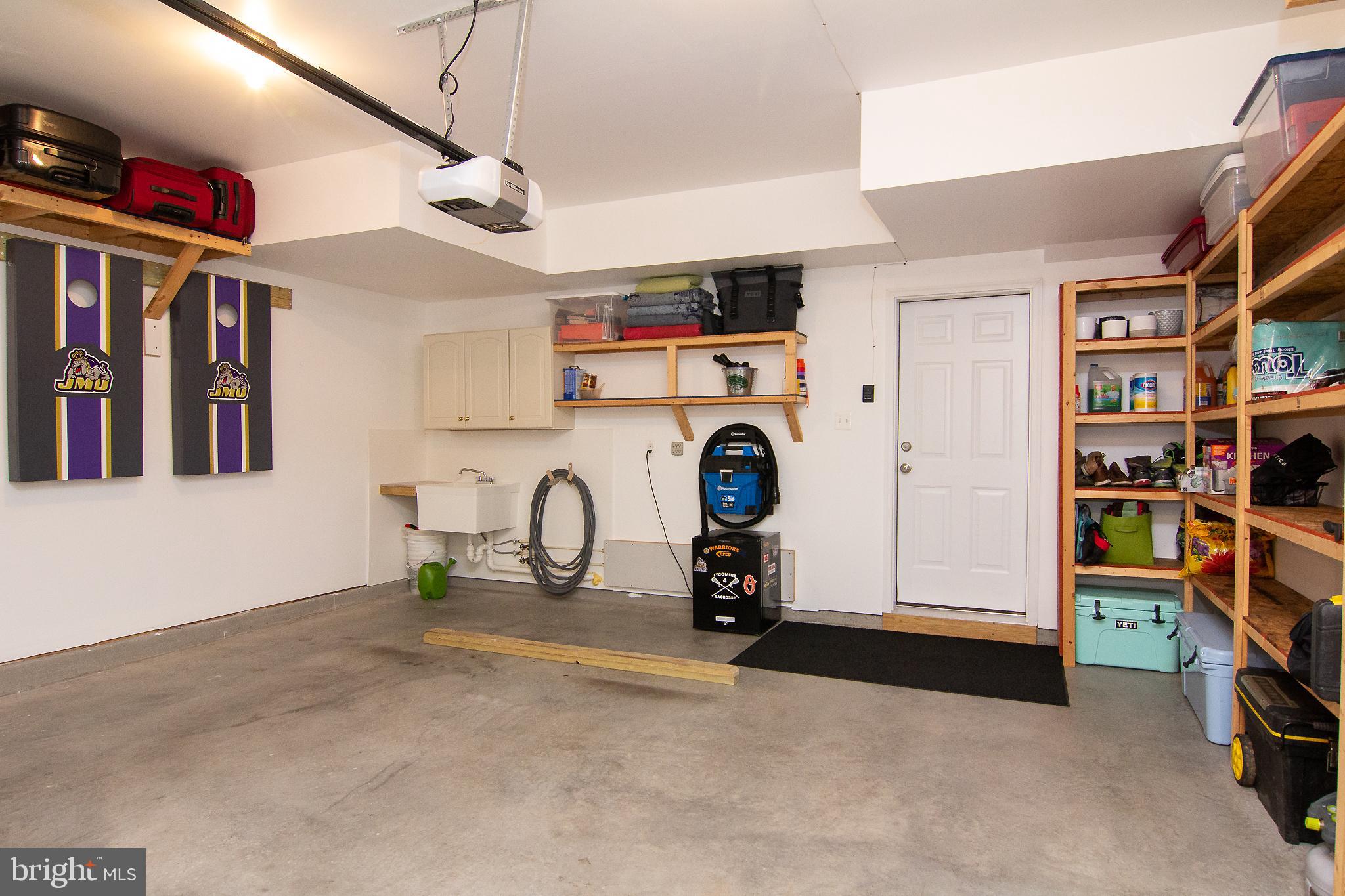 3417 Pintail Road Baltimore, MD 21222 - Photo 27 of 32 Large 2 car garage with shelving