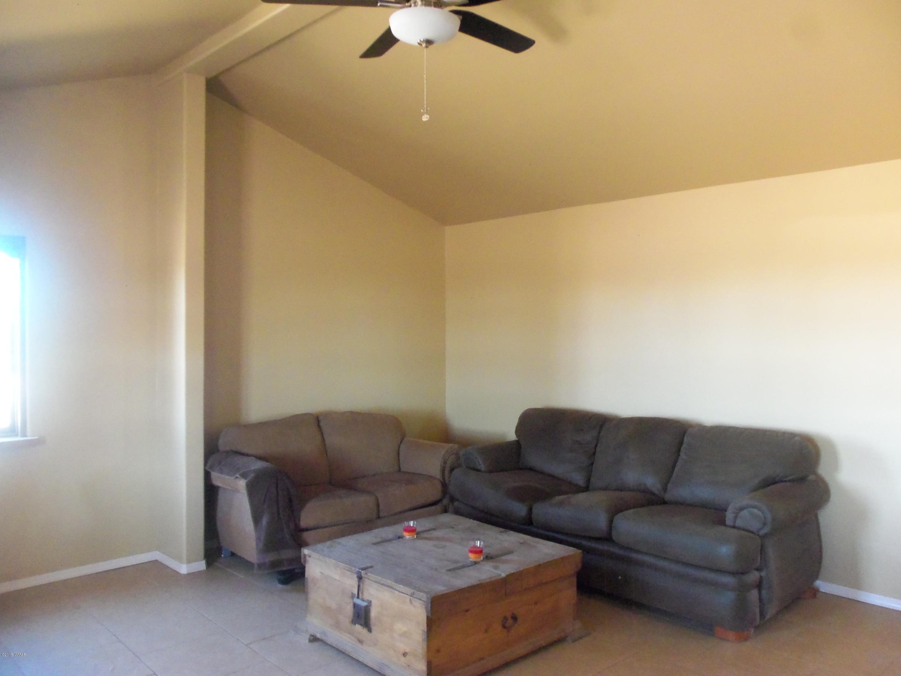 46 8307 Concho, AZ 85924 - Photo 17 of 34 a living room with furniture and a ceiling fan